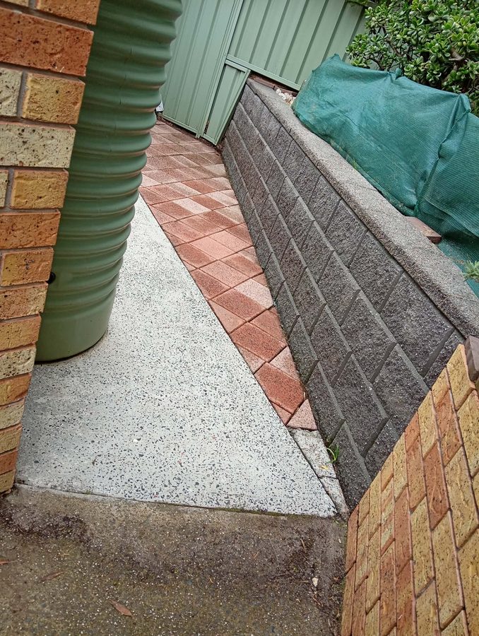 After: the same path and wall pressure washed clean